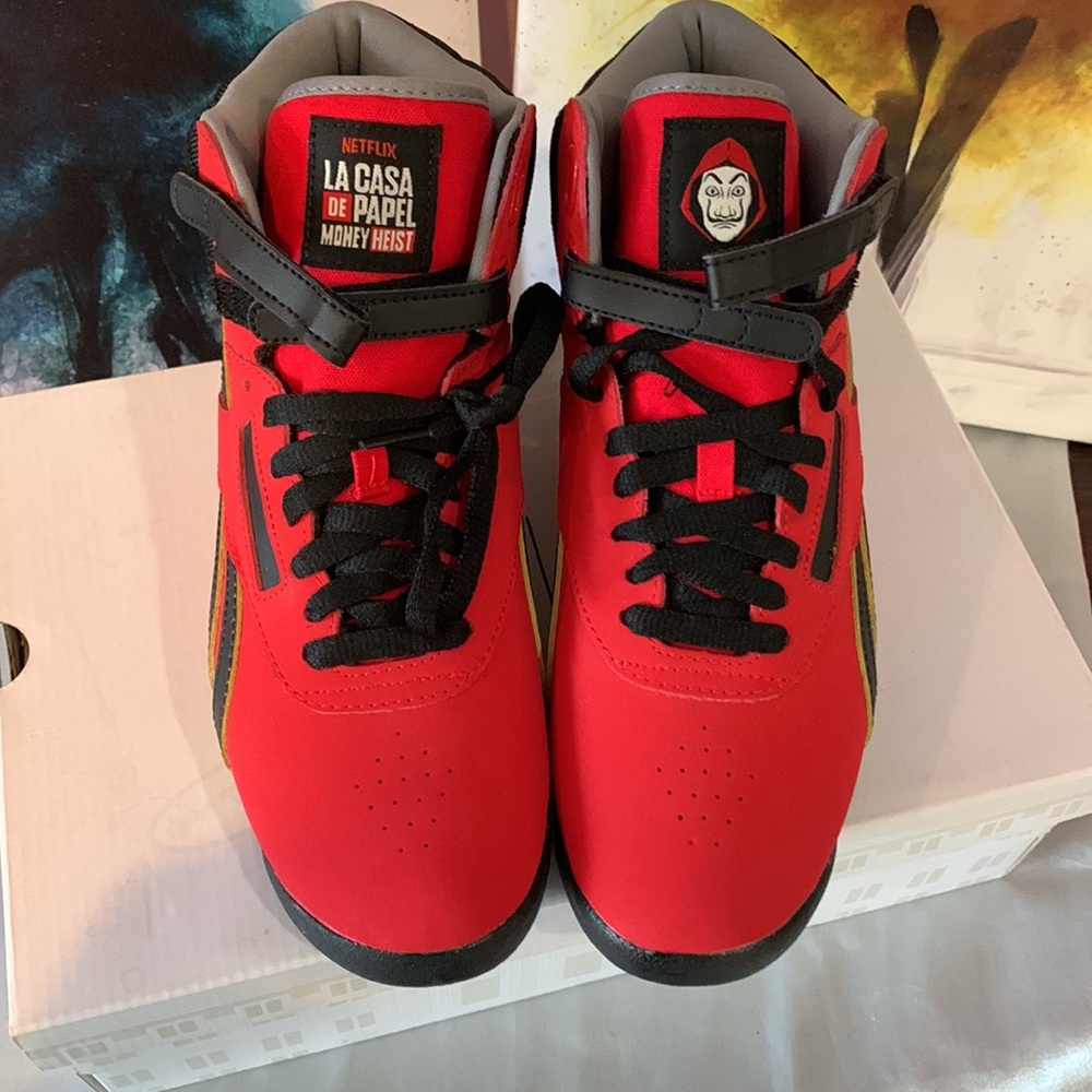 Reebok La Casa Del Papel Red and Black high tops Woman’s Size 9.5